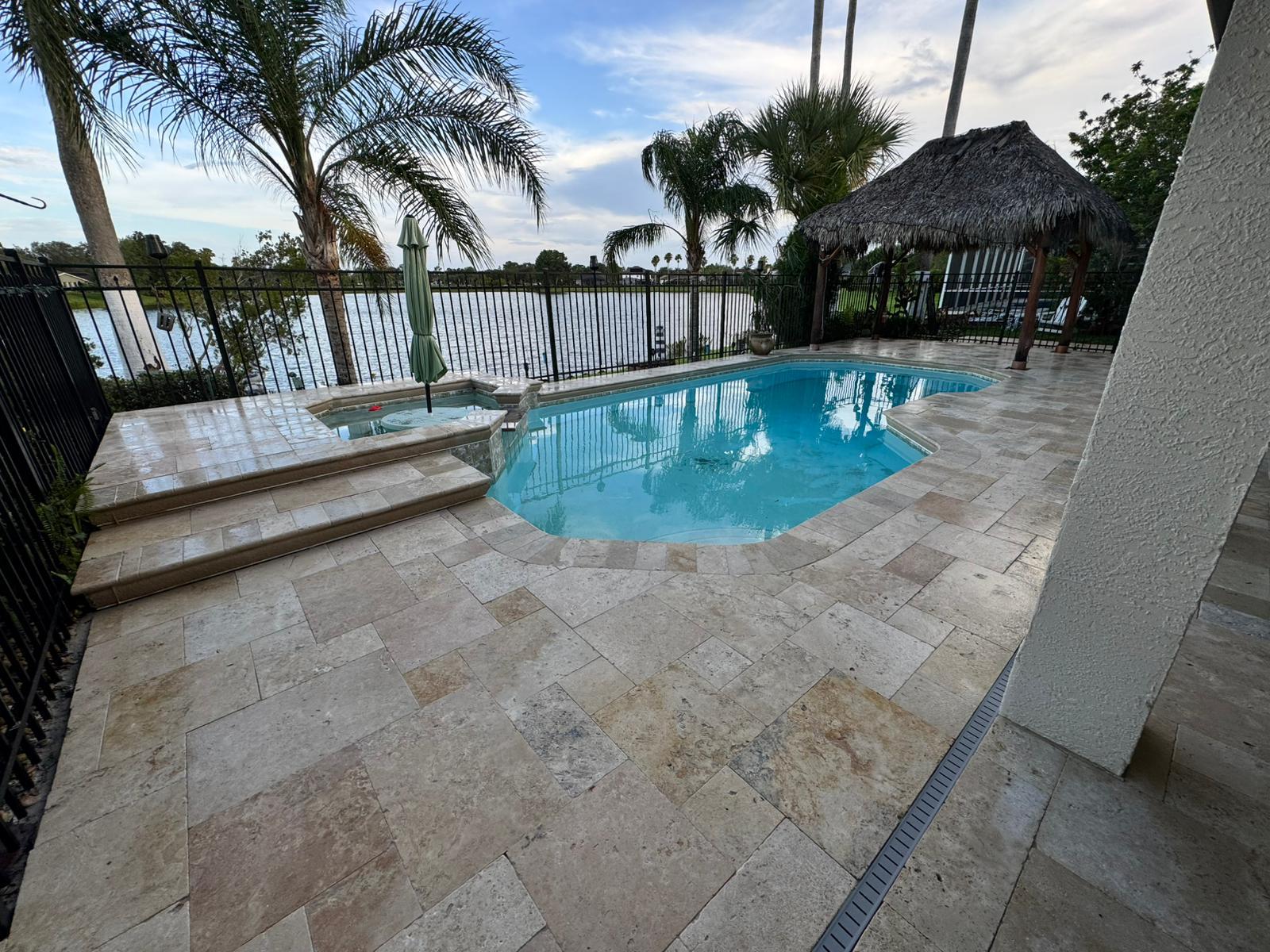 Travertine pool deck lakefront